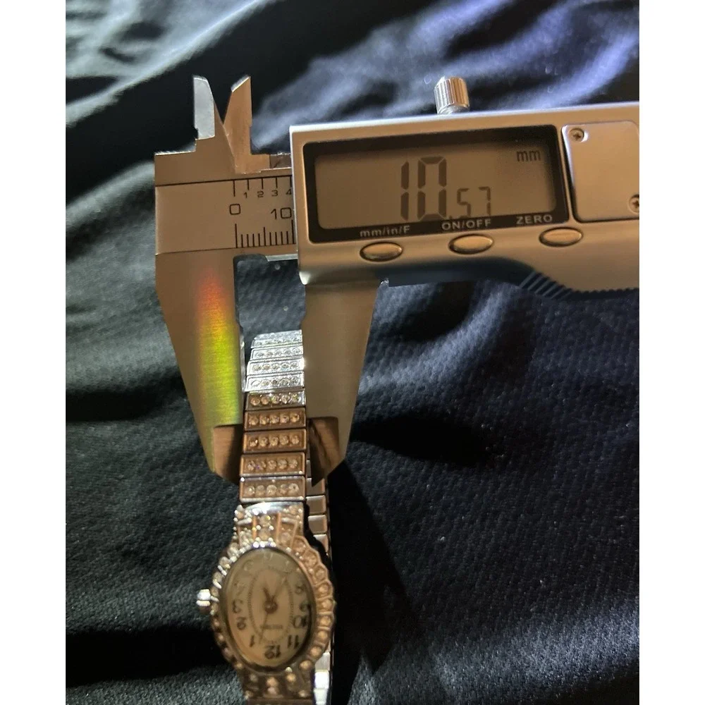 Elgin EG9058 Women's Oval Analog Clear Stone White Dial Stretch Band Bling Watch